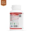 Image of a bottle of blood builder supplement with fresh fruits and leafy greens.