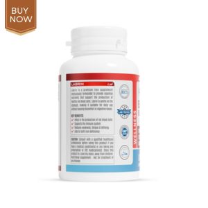 Image of a bottle of blood builder supplement surrounded by fresh fruits and leafy greens.